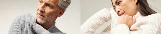 Ein Herr in einem grauen Pullover und eine Dame in einem beigen Pullover