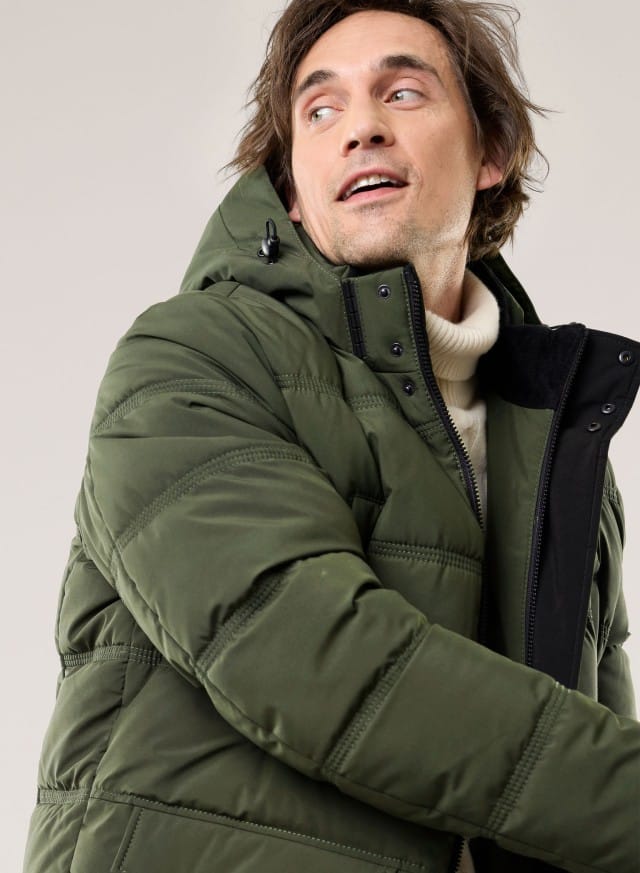 Abbildung Oberkörper Herr in Jacke