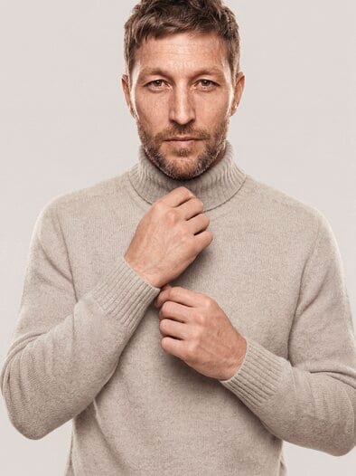 Rollkragenpullover aus Lammwolle Wollweiß