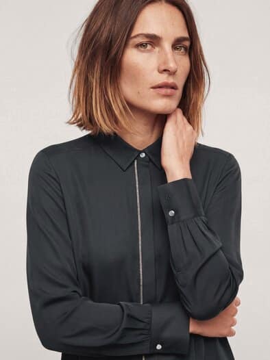 Bluse mit Glitzerkante Schwarz